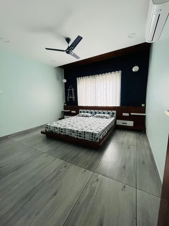 First floor room with low-height king size bed and AC, attached walk-in closet and washroom